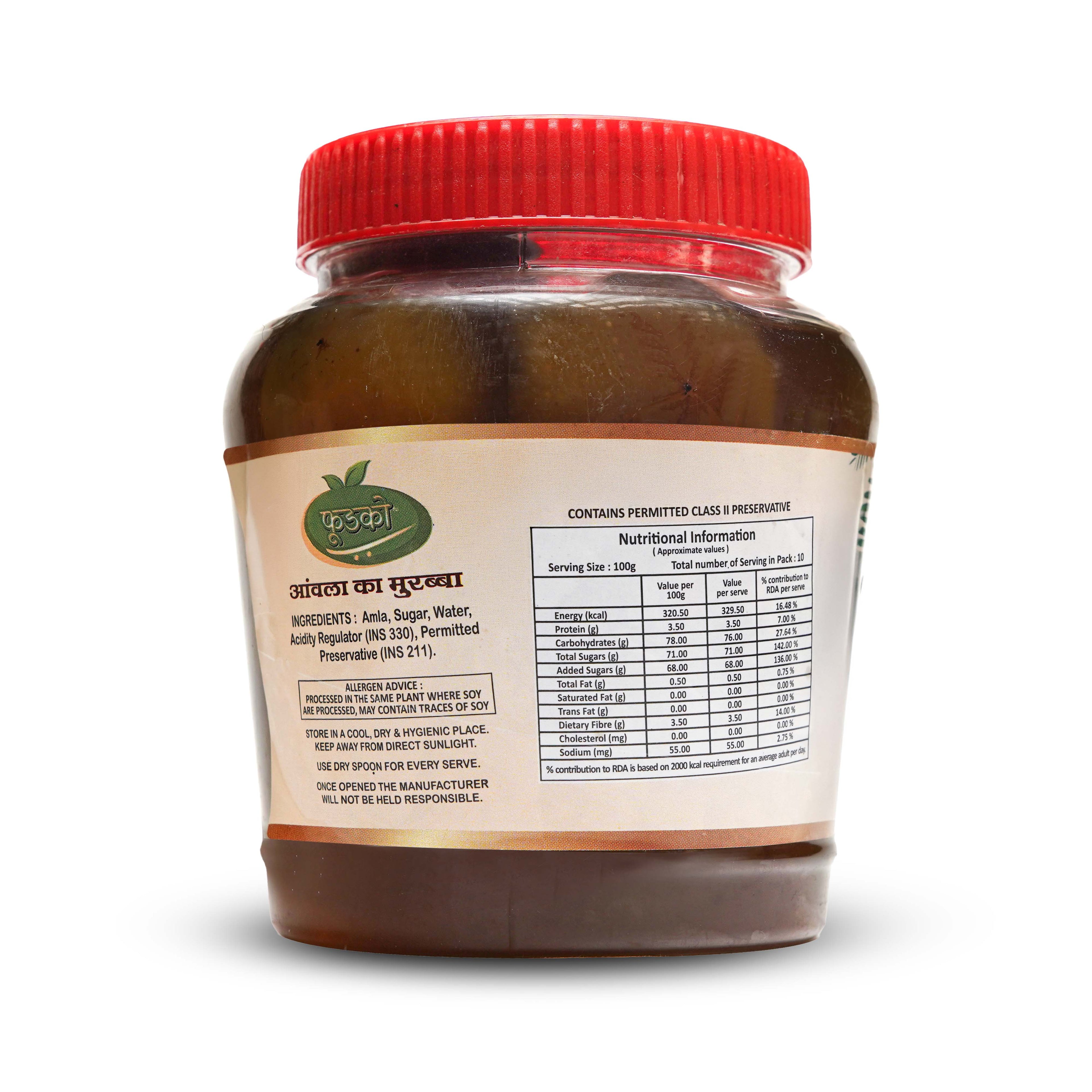 Jar of a brown product with a red lid on a white background