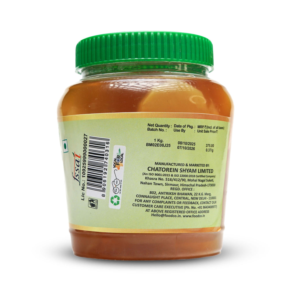 Jar of food with green lid and label on a white background