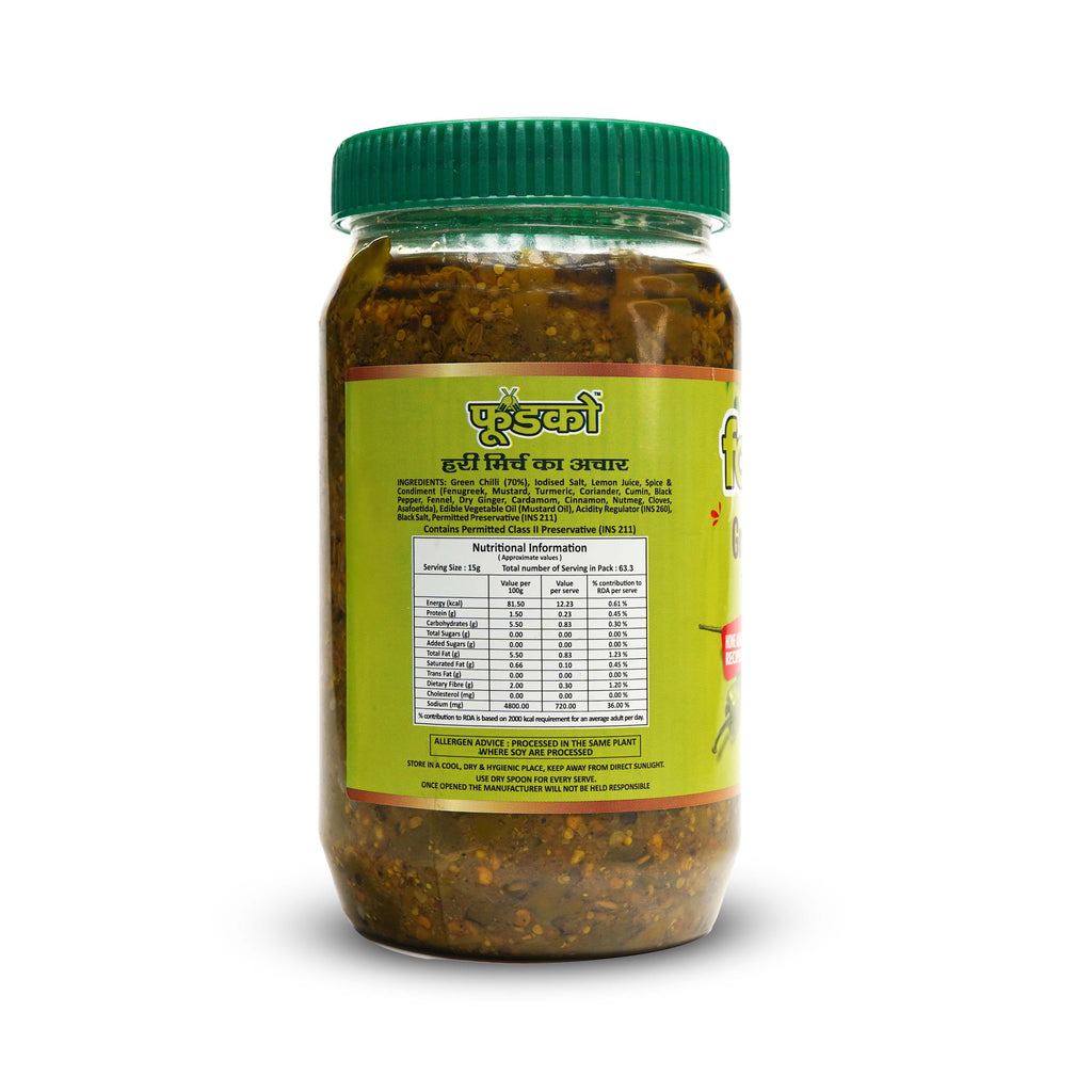 Jar of curry with a green lid on a white background