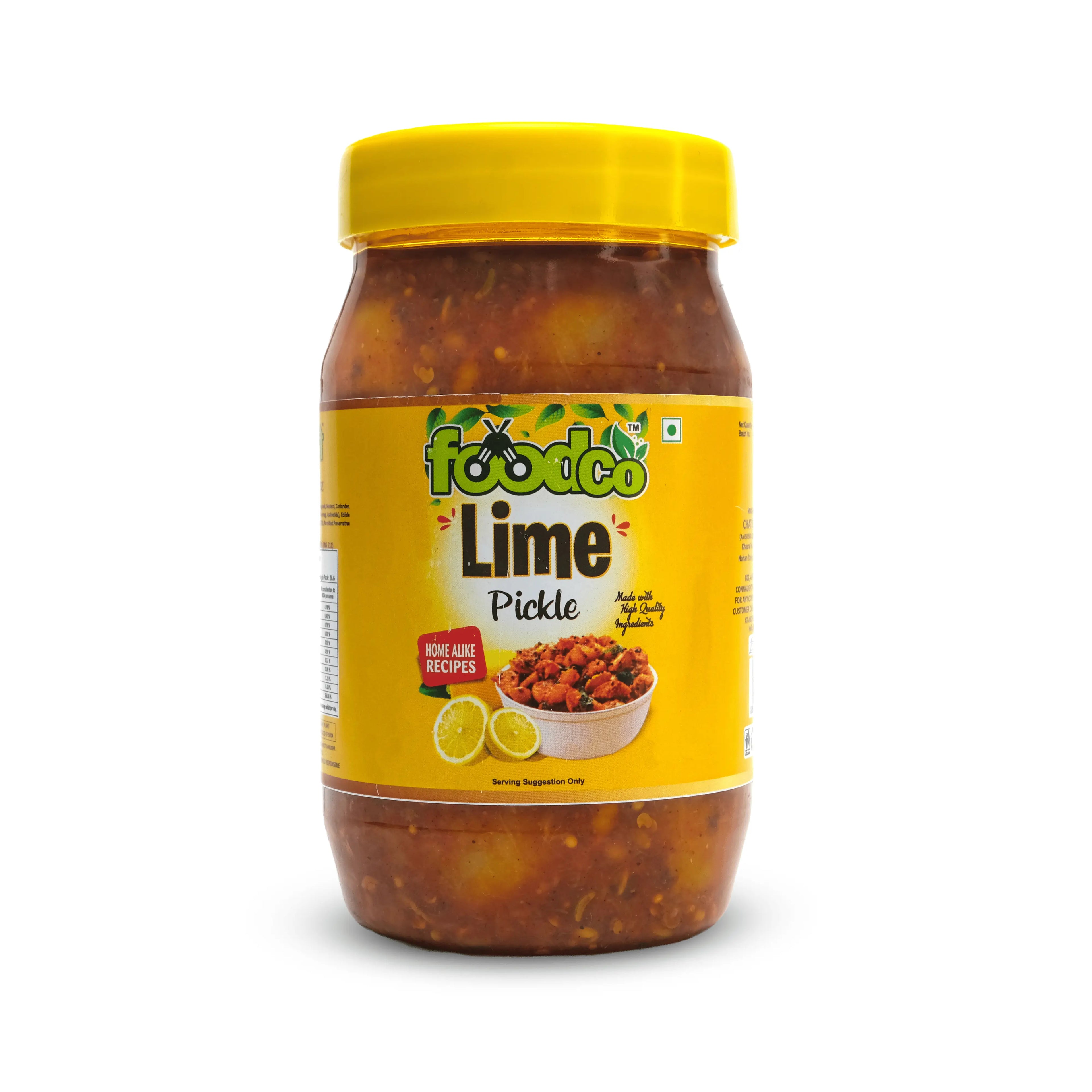 Jar of lime pickle with yellow lid and label on a white background