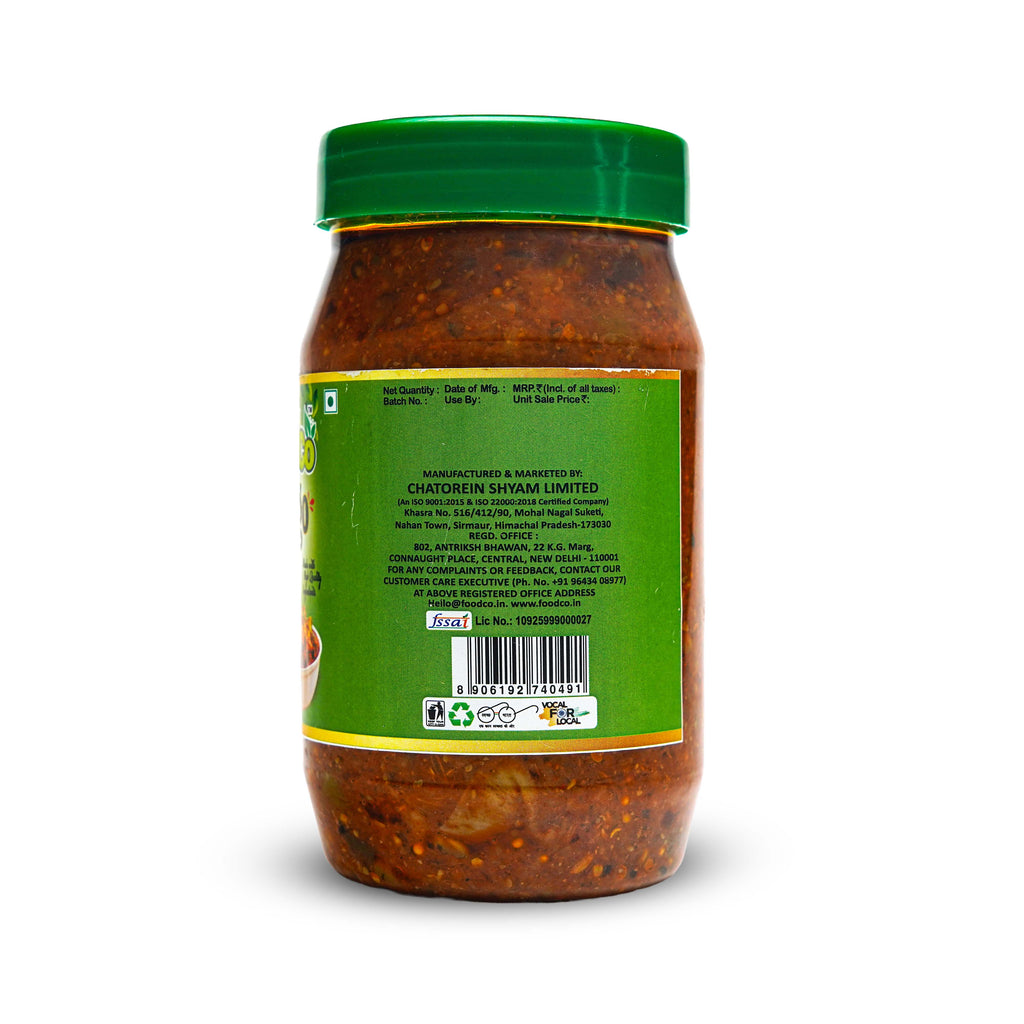 Jar of Chutney with green lid and label on a white background