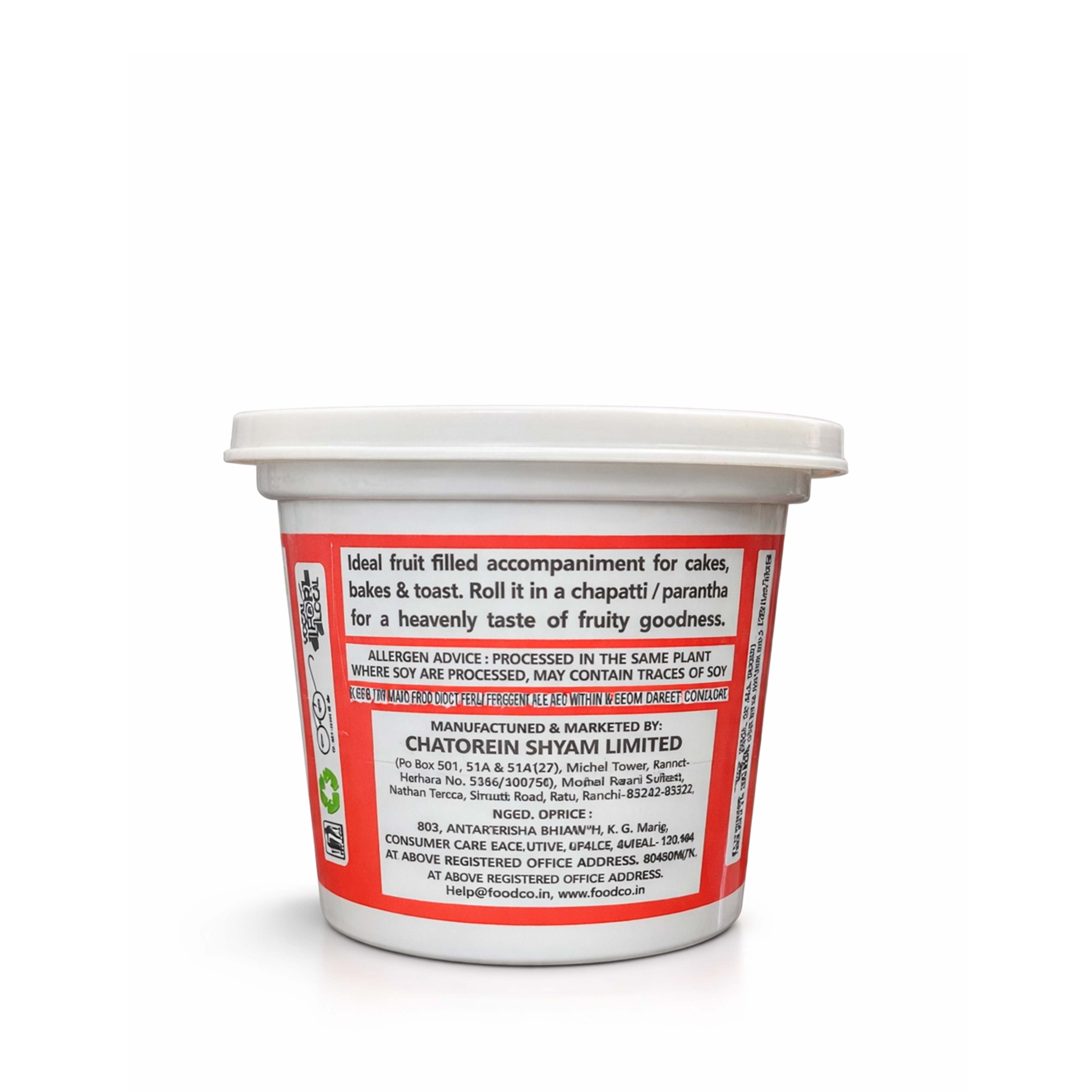 Container with a red label on a white background