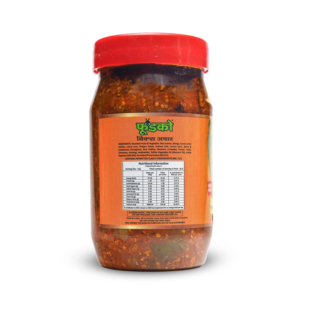 Jar of red chili paste with a red lid on a white background