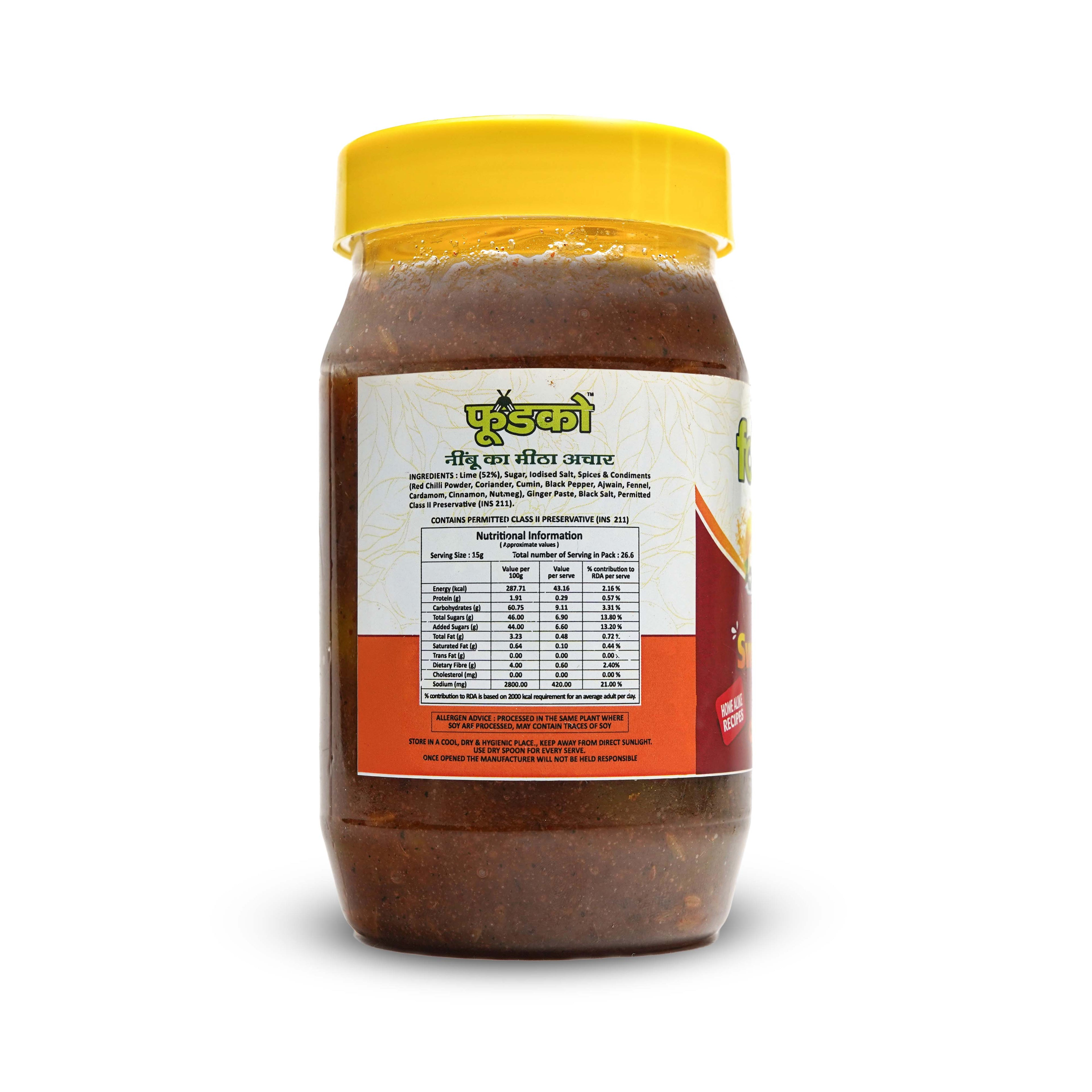 Jar of brown paste with a yellow lid on a white background
