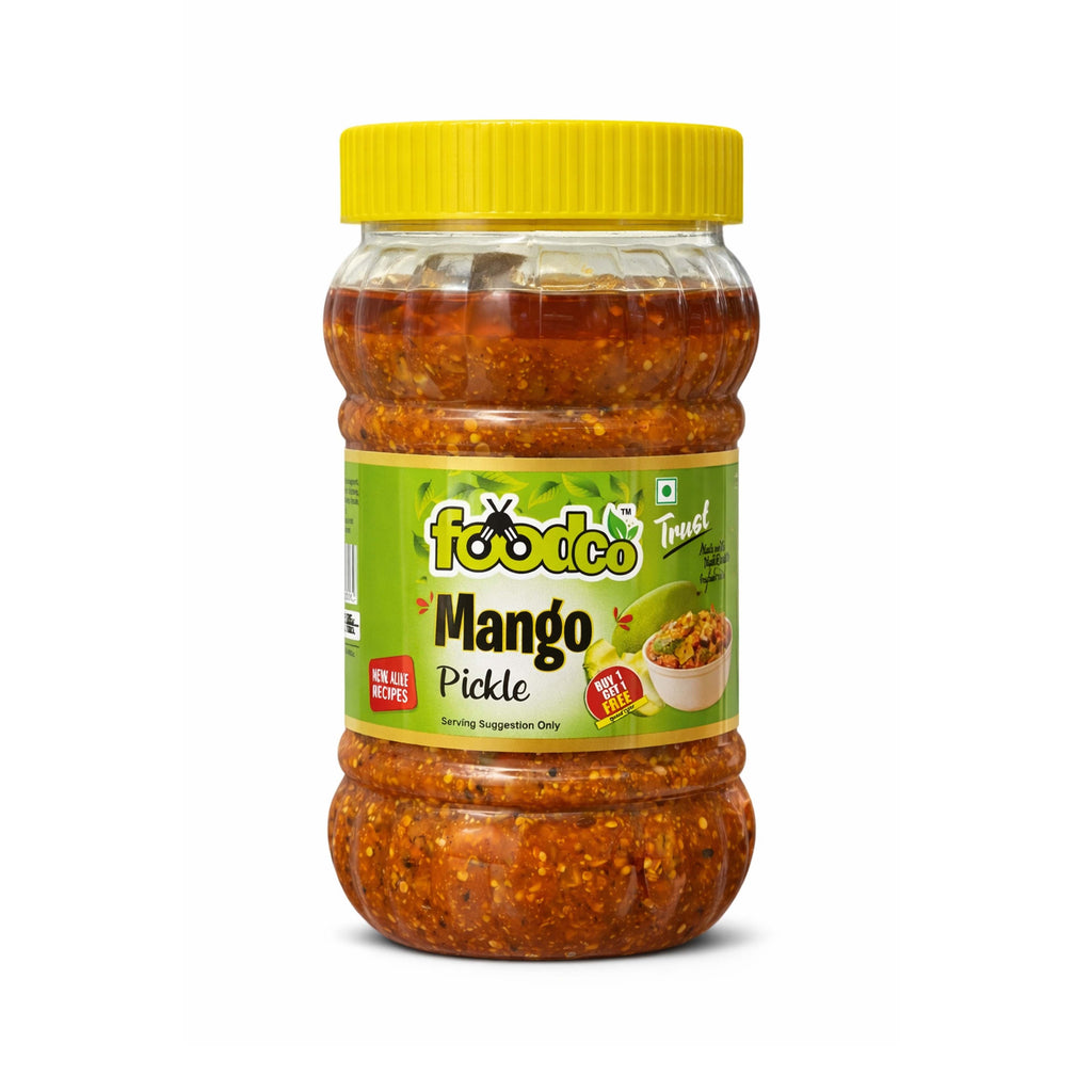 Jar of mango pickle with a yellow lid on a white background