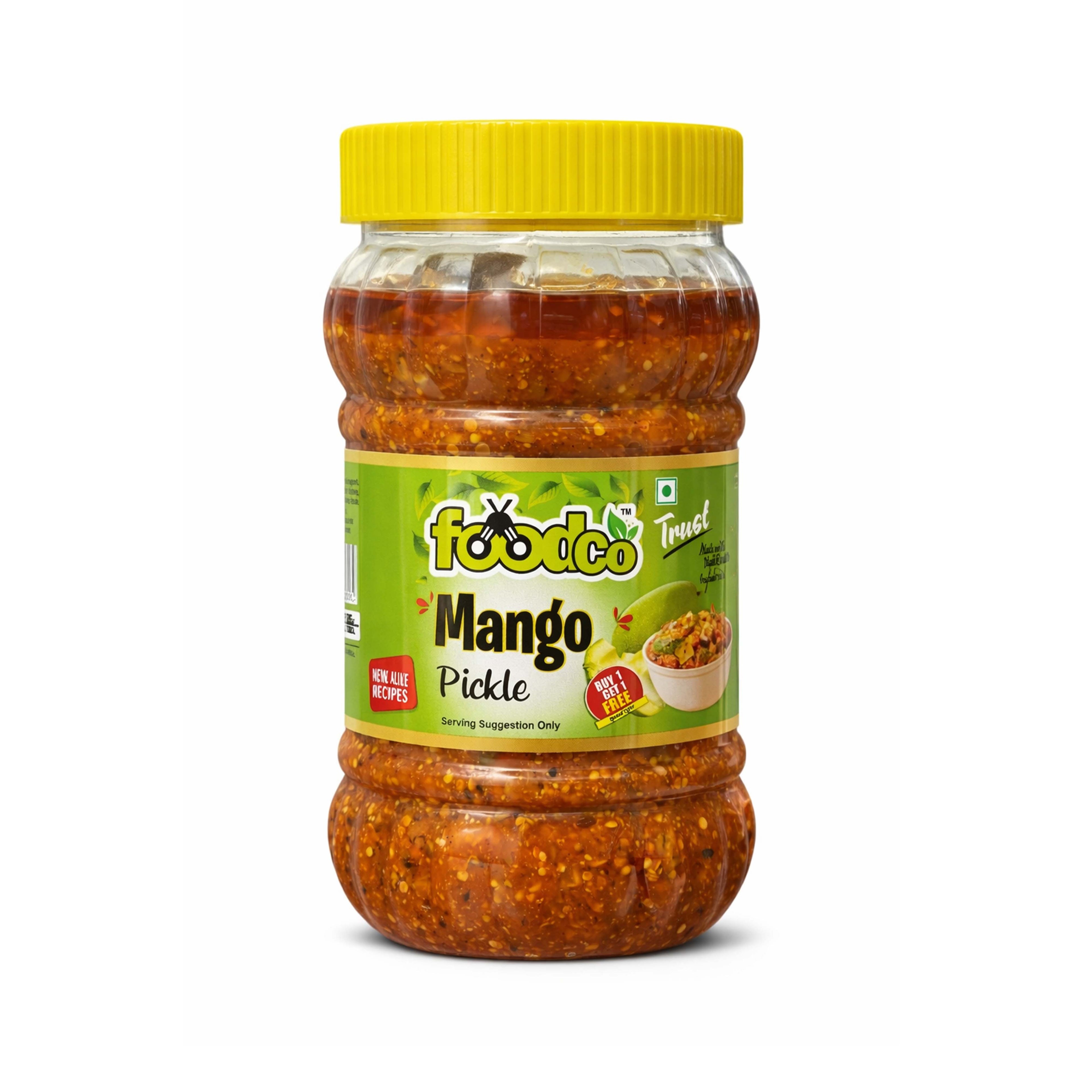 Jar of mango pickle with a yellow lid on a white background