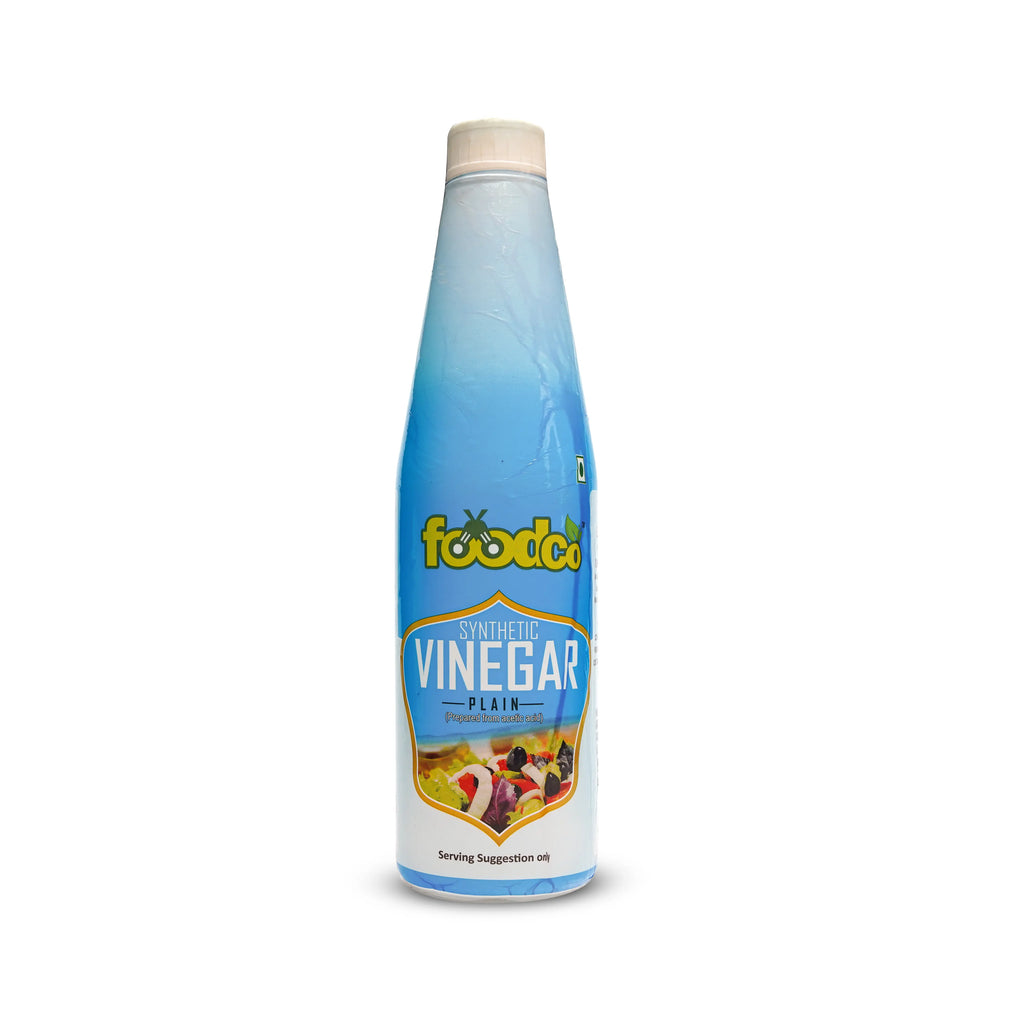 New Bottle of Foodco plain vinegar on a white background