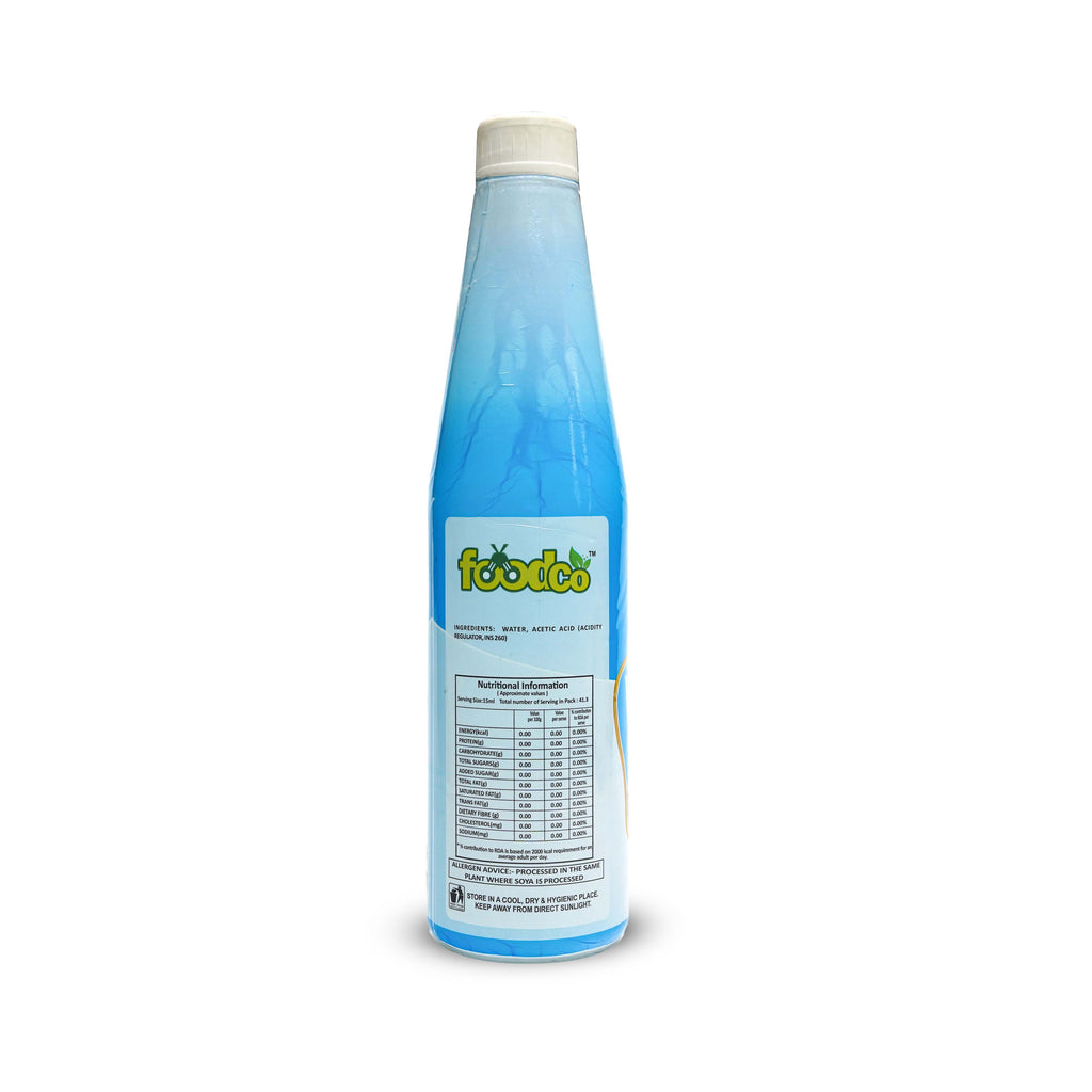 Blue bottle with a label on a white background